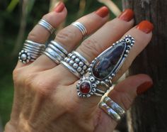 "EUDIALYTE STATEMENT RING WITH CARNELIAN -- handcrafted in oxidized STERLING SILVER -- ornamental oxidized silver work ARTISAN MADE --- Power Ring US SIZE 8.25 (8 1/4)  AN ULTRA-UNIQUE AND EXQUISITE pairing of EUDIALYTE AND CARNELIAN in this one of a kind designer statement ring, set in oxidized Sterling Silver, created for the bohemian jewelry lover and wearable art collector.  Signed and Dated 2023.   Perhaps a true power ring with healing properties from both of these powerful gemstones. A BI Handmade Bohemian Carnelian Ring, Bohemian Handmade Carnelian Rings, Unique Handmade Garnet Ring, Artisan Hand Forged Red Jewelry, Ring Of Power, Eye Ring Silver, Balancing Emotions, Big Stone Ring, Healing Gemstones