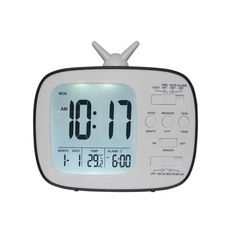 an alarm clock with the time at 11 00 pm on it's display, isolated against a white background