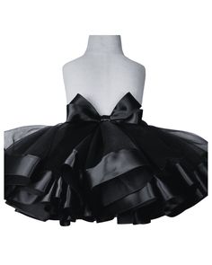 This is a black tutu skirt with a black satin ribbon.  Beautiful for birthdays or any celebrations like Halloween.  Handmade and can be made to order at any size or age.  Ready for the ship. Baby girl tutu skirt.  Toddler girl outfit.  Birthday party outfit.  Toddler outfit.  My tutus are all made by sewing and ironing.  It has a perfect finish. My tutus are all made by sewing and ironing.  It has a perfect finish. Rainbow Tutu Skirt. Baby girl tutu dress. Toddler girl tutu skirt. Toddler dress. Elegant Black Tutu Dress For Pageant, Black Tulle Dress For Pageants, Princess Style Tutu Dress With Bow For Party, Black Tutu Dress With Ruffles For Dress-up, Black Tutu Dress With Ruffles For Party, Black Ruffled Tutu Dress For Parties, Elegant Black Ruffled Tutu Dress, Black Dress With Satin Bow For Party, Fitted Tutu Dress With Bow For Party