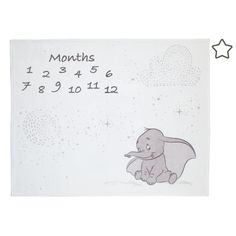 an elephant is sitting on the ground with stars in the sky and numbers written below it