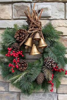 a christmas wreath with pine cones and bells