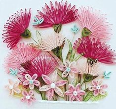 pink and white flowers in a vase with butterflies on the petals, against a white background