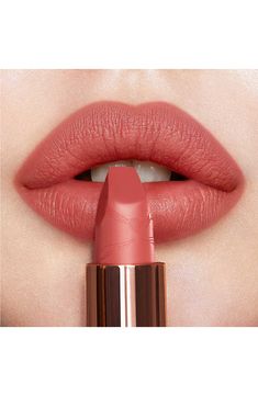 What it is: A rosebud-pink matte-finish lipstick with a long-lasting, buildable, hydrating formula.What it does: These dreamy, nuanced, rosebud shades help you look like the most beautiful version of you. The lipstick features 3D glow pigments that help lips appear wider and fuller, and its matte formula is enriched with Charlotte's secret ingredient and orchid extract to protect and soothe, delivering a cashmere-like finish. Its unique square-angled tip mimics the shape of a lip brush for preci Charlotte Tilbury Looks, Revolution Lipstick, Charlotte Tilbury Matte Revolution, The Look Of Love, Look Of Love, Shop Makeup, Lip Hydration, Long Lasting Lipstick, Lip Brush