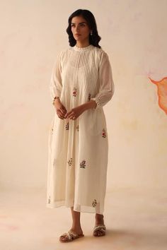 Buy Ivory Dress Chanderi Hand Embroidered Flowers Khubani With Slip For Women by Begum Pret Online at Aza Fashions. White Bohemian Dress With Cutdana, Bohemian Cotton Silk Wedding Dress, Cream Embroidered Chanderi Dress, Embroidered Chanderi Cream Dress, White Anarkali Dress In Cotton Silk, Embroidered Cream Chanderi Dress, Traditional White Chanderi Embroidered Dress, Traditional White Embroidered Chanderi Dress, Off White Embroidered Chanderi Dress