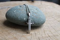 This beautiful cross pendant makes a great gift for yourself or your loved one. D E T A I L S *It features a  high quality stainless steel cross pendant. Pendant measures 36 x 20mm.  Available also in gold. *It hangs from a non tarnish stainless steel chain. *It closes with a large stainless steel lobster clasp. *Length: Choose the length you prefer from the drop down menu. Use the length chart as a reference. On the model you see the 26 inch option. S I Z I N G * H E L P : The smallest necklace Stainless Steel Cross Pendant, Mens Cross Necklace, 20 Inch Necklace, Jun 2023, Necklace Mens, Small Necklace, Necklace Cross, Mens Necklace, Steel Cross