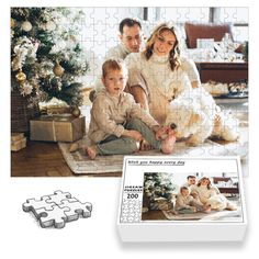 a puzzle with a family sitting on the floor next to a christmas tree