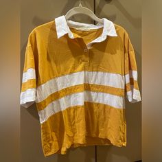 Selling A Ton Of Clothes That Just Don’t Fit Anymore/Never Worn/ Hardly Worn. Pls Look At My Page And Bundle!!:) Urban Outfitters Yellow And White Collared Shirt W Stripes. Condition: Hardly Worn Maybe 2 Times Size: Small But Oversized (Fits Like A Medium) Urban Outfitters Yellow Cotton Top, Urban Outfitters Yellow Tops For Spring, Yellow Urban Outfitters Top For Spring, Trendy Yellow Collared Tops, Yellow Collared T-shirt For Summer, Retro Mustard Cotton Top, Retro White Tops From Urban Outfitters, Trendy Yellow Tops From Urban Outfitters, Urban Outfitters Yellow Casual Tops