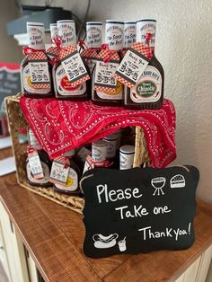 a basket filled with lots of different types of condiments on top of a table