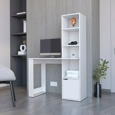 a white computer desk sitting on top of a hard wood floor