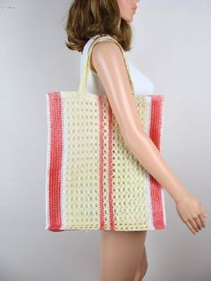 Vintage "Super Tote" woven tote bag from 1983.  Would make the perfect market, beach or everyday bag.  It features woven raffia like material in shades of white, cream and watermelon pink.  Measures 17.5" x 14" x 2.5" and has two 16" top handles.  Still has the original hang tag that is stamped: "Made in Taiwan for W.A. Stratford, CT 06497", "1983".  In excellent vintage condition.  It seems as though it was never used.  The hang tag does have some light wear / waviness.  Please see photos for details. Retro Natural Straw Bag For Everyday Use, Retro Natural Straw Bag For Everyday, Retro Crochet Bag For Beach, Vintage Rectangular Crochet Bag For Beach, Vintage Square Shoulder Bag For Summer, Vintage Rectangular Crochet Bag For The Beach, Vintage Summer Shopping Bags, Vintage Rectangular Crochet Bag For Vacation, Vintage Crochet Beach Bag