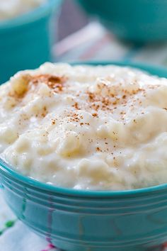 an old fashioned rice pudding recipe in a blue bowl