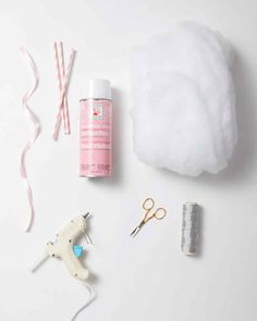 the supplies needed to make this diy bunny craft are laid out on a white surface