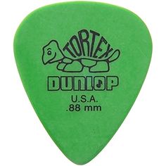 green guitar picker with the words tortex dumop printed on it