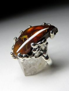 Silver ring with natural Fire Agate  gemstone origin - Mexico agate measure - 0.35 х 0.55 х 0.98 in / 9 х 14 х 25 mm weight of the agate - 11.5 carat weight of the ring - 9.11 grams ring size - 7.25 US  ref No 3875 Worldwide shipping from Berlin, Germany Jewelry Magic, Art Nouveau Ring, September Birthstone Jewelry, Brown Stone, Fire Agate, Caramel Brown, Birthstone Gifts, September Birthstone, Unisex Jewelry