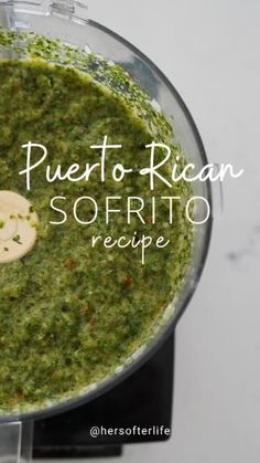 a food processor with pesto in it and the words, puerto rican sofrito recipe