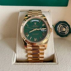 Rolex 2022 Day-Date 40 'Green Roman Dial' 228238 President 18k Yellow Gold Unworn In Stock 228238 Automatic 40mm Green Yellow gold - Watch with original box and original papers - 3255 - 10ATM - Sapphire crystal - 2022 Rolex Presidential Gold Men, Green And Gold Watch, Gold Rolex Mens, Rolex Green Dial, Green Watch Men, Gold Watches For Men, Classical Facade, Rolex Presidential, Cartier Watches Women