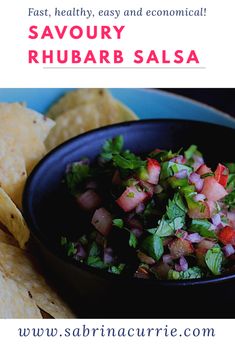 a blue bowl filled with salsa next to tortilla chips