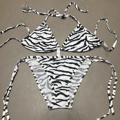 One Size (Bikini Ties Around Neck, Back And On Both Sides Of The Bottoms) There Is Also Enough Fabric To Cover The Majority Of Cup Sizes. Black/White Zebra Striped 100% Polyester New Condition (Does Not Have Tags) Measurements Are Provided. The Black And White Bikini Is The One For Sale The Polka Dot One Is For Measurements Only. Zebra Print Beachwear Swimwear For Sunbathing, Zebra Print Swimwear For Sunbathing, Zebra Print Swimwear For Sunbathing In Summer, Zebra Print Beachwear For Sunbathing, Fitted Zebra Print Swimwear For Summer, Trendy White Triangle Top Swimwear, Fitted Zebra Print Triangle Top Swimwear, Summer Swimwear With Zebra Print, Zebra Print Swimwear For Summer Beach