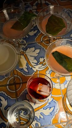 several different types of drinks on a table