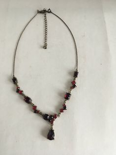 "Here is a red crystal necklace with rhinestones in a glamorous shade of ruby. The stones are prong set and they are well complimented by the antiqued gold tone settings. This is a very well made signed vintage piece in excellent condition. It is signed NW and Avon on an oval cartouche. It is 17 1/2\" long and has a 3 1/2\" extender chain. Please see this section of my shop for more vintage costume jewelry: https://www.etsy.com/shop/ChrisandTine?section_id=17309162 My full shop: http://www.chris Rhinestone Costume, Red Crystal Necklace, Rhinestone Costumes, Avon Vintage, Jewelry Lockets, Y Necklace, Jewelry Accessories Ideas, Red Necklace, Ruby Necklace