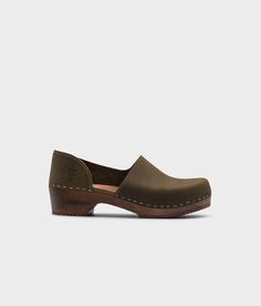 low heeled closed-back clogs in olive green nubuck leather stapled on a dark wooden base Cork Sandals, Wooden Clogs, Clog Sandals, Elegant Shoes, Boot Shop, Low Heels, Clogs, Heel Height, Man Shop