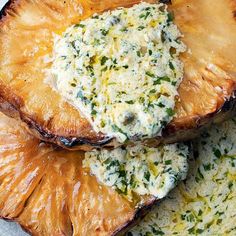 grilled pineapple slices topped with cheese and herbs