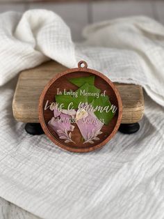 a memorial ornament with flowers on it