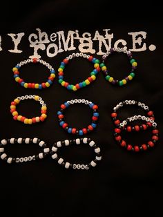 several bracelets with beads are displayed on a black background that says, i love my performance