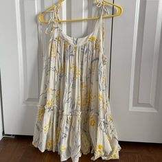 Never Worn Beige Sundress For Spring Brunch, Beige Mini Sundress For Daytime, Daytime Flowy Beige Mini Dress, Cream Sundress For Spring, Beige Sundress For Spring Daywear, Beige Sundress For Spring Daytime, Cream Sundress Mini Dress For Spring, Flowy Cotton Mini Dress For Daytime, Spring Bohemian Mini Dress For Daytime