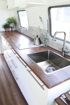 the kitchen counter is clean and ready to be used as a place for cooking or eating