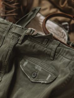 These chinos are perfect for taking on the day and whatever it throws at you. Inspired by Military Pants and casual basics that combines military and nostalgia. Cut from a cotton twill, a loose fit guarantees movement with ease. Button pockets keep all your belongings safe. Army Fatigue, Casual Basics, Denim Overalls Shorts, Military Pants, Concept Clothing, Chino Jeans, Parka Coat, Us Army, Chinos Pants