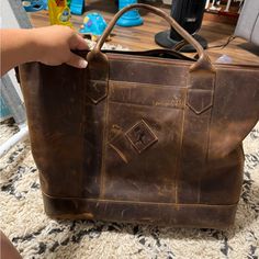 Baseballism Tote Bag Smoke Free Home Worn In But Still In Great Condition You Are Able To Use Lexi Leather Conditioner To Clean And Make The Purse Look Brand New Since It Is Made Of Vintage Baseball Glove Leather!! Brown Duffle Bag With Removable Pouch For On-the-go, Dark Tan Leather Bag For On-the-go, Dark Tan Bags With Leather Lining For Everyday Use, Dark Tan Tote Shoulder Bag For Travel, Dark Tan Bag With Leather Lining For Everyday Use, Dark Tan Tote Bag For Travel, Dark Tan Leather Satchel For Everyday Use, Dark Tan Tote Bag With Leather Lining, Brown Leather Lined Bag For On-the-go