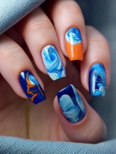 55+ Blue and Orange Nail Designs and Ideas | Sarah Scoop Blue And Orange Short Nails, Orange And Blue Acrylic Nails Designs, Blue Orange Nail Art, Orange And Blue Manicure, Orange Snd Blue Nails