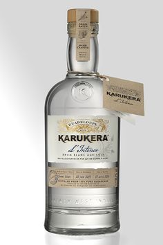 a bottle of karukera liquene with a tag on the side