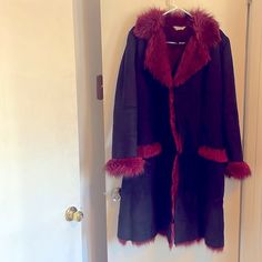 Gorgeous Black Faux Suede With Red Faux Fur Lining, Collar, Cuffs, And Pocket Trim. Open Front With Hooks European Size T4 Xl Approx 42" Long Chest Approx 21" Pit To Pit Brand=Faust Made In France Rare Find! Good Condition Red Fitted Outerwear With Faux Fur Trim, Fitted Red Outerwear With Faux Fur Trim, Red Fur Coat For Fall, Coat Black, Black Coat, Front Open, Faux Suede, Made In France, Black Red