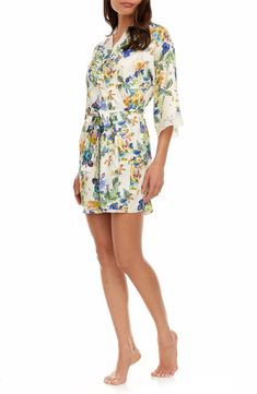 Silky-soft satin refines the flowy silhouette of these floral pajamas pairing a lace-trimmed camisole with coordinating shorts and a matching robe. 18" top center front length; 1 1/2" inseam; 26" leg opening; 11 1/2" front rise; 13" back rise; 35" robe length (size Medium) Includes two-piece short pajamas and short robe Top has V-neck; adjustable straps Bottoms have elastic waist Robe has three-quarter sleeves; removable tie belt 100% polyester Hand wash, dry flat Imported Feminine Satin Sleepwear For Summer, Spring Silk Sleepwear, Silk Sleepwear For Spring Season, Silk Floral Print Sleepwear For Spring, Silk Sleepwear With Floral Print For Spring, Spring Silk Sleepwear For Bedtime, Elegant Sleepwear For Pajama Party In Spring, Elegant V-neck Sleepwear For Vacation, Summer Silk Sleepwear With Lace Trim