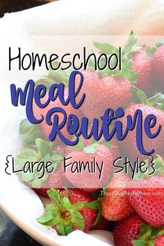 a bowl full of strawberries with the words homeschool meal routine and large family style