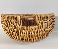 a basket made out of wicker sitting on top of a table