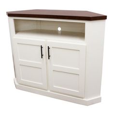 a white entertainment center with two doors and a brown top