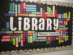 a library bulletin board with the word library written on it