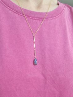 Beautiful Labradorite Waterfall Necklace. Always a gorgeous and magical gemstone! Wear this with a V neck or over a t-shirt for a more casual look. The length of the drop from the little center circle down to the bottom of the stone is just over 2 1/2 in. The chain on the drop is a beautiful bar chain. Each Labradorite is unique and will slightly vary as they are natural. Some will have more of a blue color and others may be more green, yellowish-green, purple-blue, and silverish. If you have a Bohemian Jewelry With Adjustable Teardrop Chain, Bohemian Teardrop Jewelry With Adjustable Chain, Dainty Teardrop Necklace For Layering, Bohemian Necklace With Long Drop And Adjustable Chain, Bohemian Necklace With Adjustable Long Drop Chain, Bohemian Long Drop Necklace With Adjustable Chain, Bohemian Long Drop Necklace, Elegant Labradorite Necklace With Adjustable Chain, Dainty Teardrop Pendant Necklace With Natural Stones