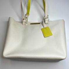 Cute And Classy Tote Bag By Longchamp! Ivory Pebbled Leather With Yellow Leather Detailing. Double Handles. Zipper Closure. 1 Inner Zippered Pocket. Dust Bag Included. Nwt! 7.24 Luxury White Shoulder Bag For Everyday Use, Everyday Luxury White Bag, White Textured Leather Shopping Bag, Everyday White Textured Leather Shoulder Bag, White Textured Leather Shoulder Bag For Travel, Longchamp Bags, Leather Detailing, Yellow Leather, Leather Tote Bag