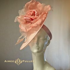 Stand out with this show-stopping, feminine rose headpiece!  Don for race day and/or any hat contest. Over-sized, luxurious velvet and silk pink rose with feather detail. Perched on a sinamay disk and matching satin headband. Perfect for Derby, Gala, Prom, Weddings, Bridal, Cocktail, High Tea, Church. Looks lovely from every angle.   *FREE SHIPPING Handmade by Aimee Fuller in Southern California See more of our collection in person if you are in: San Diego Del Mar Beverly Hills La Jolla Aimee Fuller has been a trusted online seller since 1999, and is excited to bring her jewelry and hats back to Etsy.  Though often copied by hobbyists and even high-end department stores, discriminating fashionistas from all walks of life count on Aimee's pieces to lead the trends and make one-of-a-kind sta Rose Headpiece, Shade Roses, Kentucky Derby Fascinator, Bridal Fascinator, Ladies Who Lunch, Hot Pink Roses, Kentucky Derby Hat, Royal Ascot, Handmade Hat