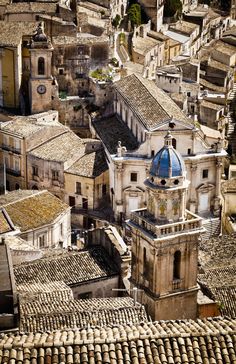 an aerial view of old buildings and rooftops