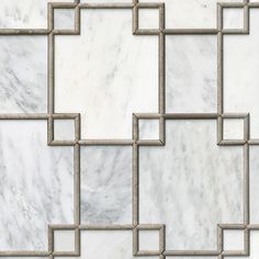 a white marble tile with square and rectangle design