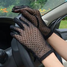 Is there any accessory more timeless or elegant than a gorgeous pair of driving gloves? We didn’t think so either. Dress them up on occasions like proms, balls, operas, galas, concerts, or photoshoots. Pair them with a parasol to protect from the harsh sun during summer days. Put the finishing touch on a decade themed costume. Whatever the event, we’ve got you-and your hands-covered, with two different lace pattens to choose from. Is floral more your style? If not, try the mesh netting look. Black Lace Gloves, Sheer Gloves, Summer Gloves, Hand Socks, Elegant Gloves, Mesh Gloves, 1920s Outfits, Gloves Women, Gloves Fashion