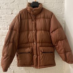 Beautiful Warm Brown Vintage North Face Down Parka (Circa 1970/80s). Great Condition, With One Small Darker Mark On Back Arm And Pricks. They Don’t Impact Condition. Rare Size Small In Rare Color- Also Worn By Rihanna. Ykk Zip. Front Velcro Pockets. Adjustable Snap Cuffs. The North Face Brown Puffer, Brown Nylon Outdoor Outerwear, Brown Parka With Double-lined Hood For Fall, Vintage Outdoor Parka With Flap Pockets, Vintage North Face, Brown Long-sleeved Parka For Cold Weather, Brown Fleece-lined Outerwear For Outdoor, Dark Mark, Down Parka