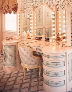 a vanity with lights on it in a room