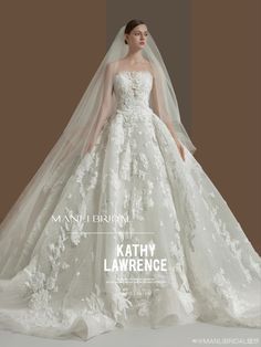 a woman in a wedding dress with a veil on her head and the words, kathy lawrence