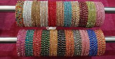 Beautiful Colourful Handmade Bangle designed By T4 Jewels. fabulous Designs Looks is very stunning & unique. these bangles are easy to wear on silky fabric like Saree and any other outfit. You can wear is on Daily way so please hurry up and Buy Mix & Match personalize metal bangle and make your moment memorable. Good Choice for Wedding Gifts Available in 2.10, 2.12, 2.14 bangle size Indian Bangles, Glass Bangles, Bangles Set, Bangles Indian, Packing Jewelry, Handmade Bangles, Silky Fabric, Bangle Designs, Other Outfits